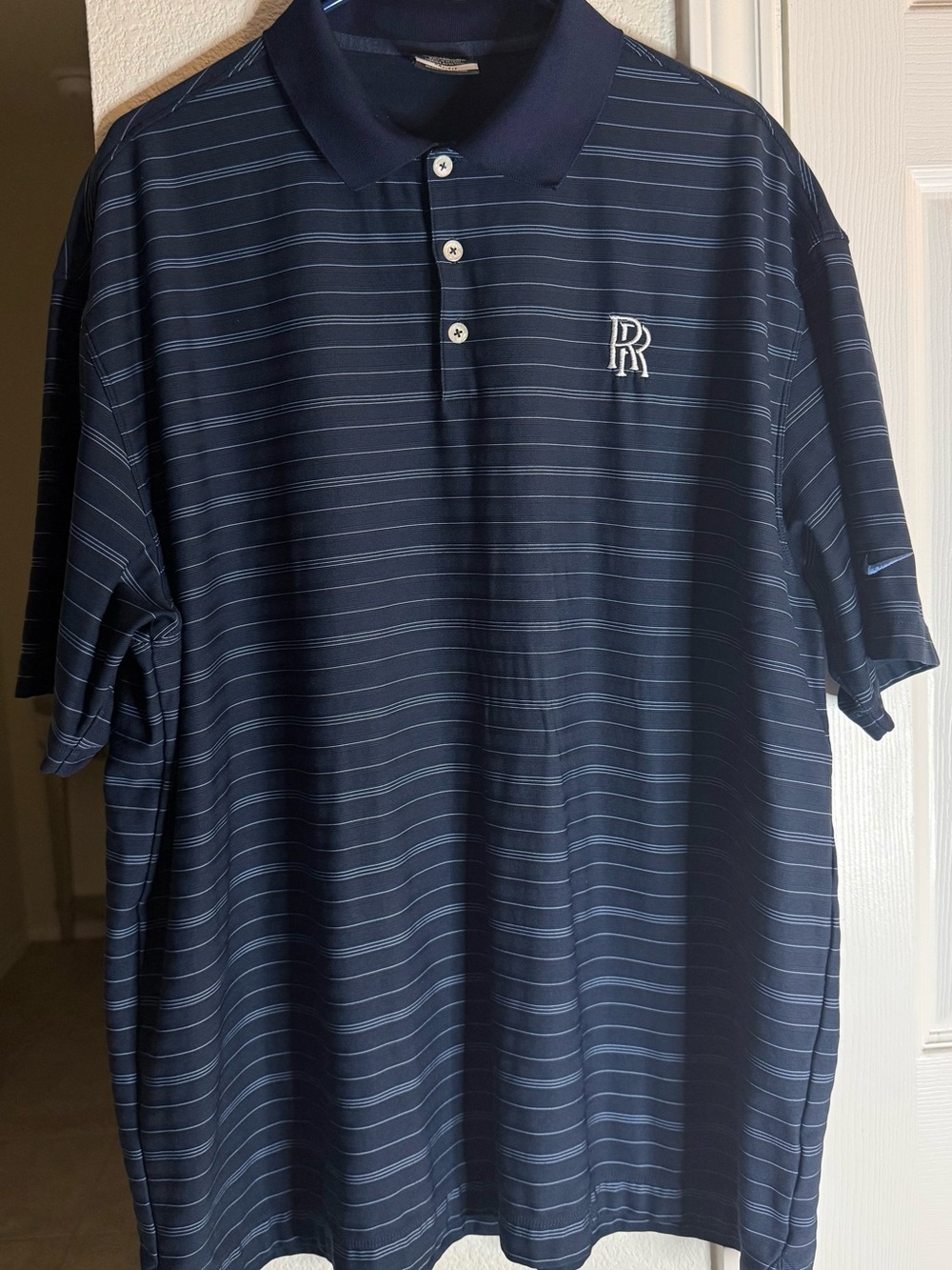 Nike Navy Polo with Light Blue Pinstripes and White Logo